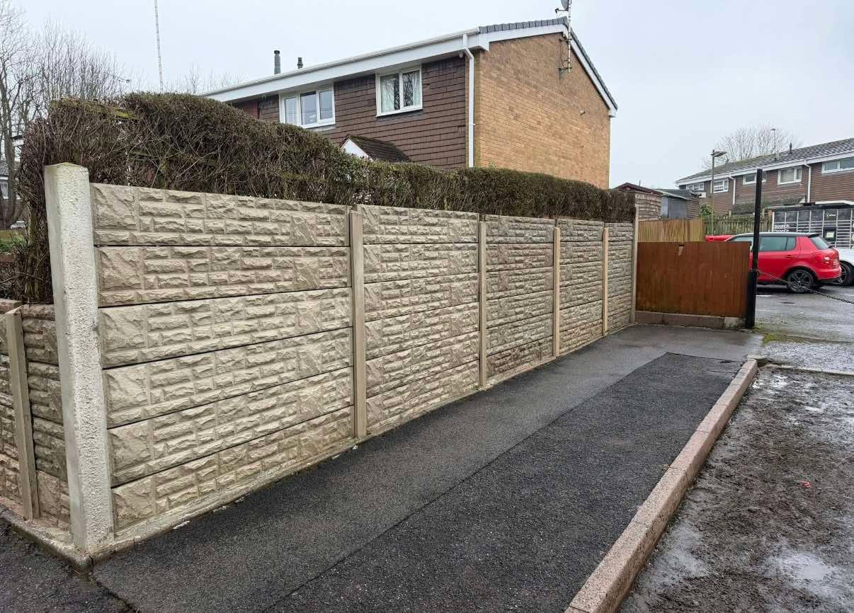 Pathway and concrete fence after cleaning